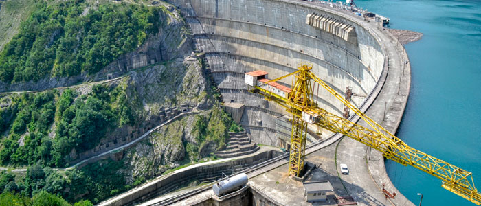 construction on a dam with crane